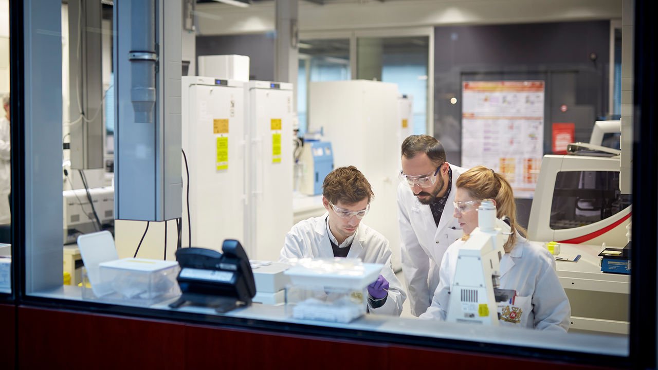 a fgroup of scientists in a lab