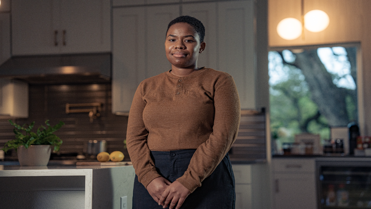 a woman standing indoors